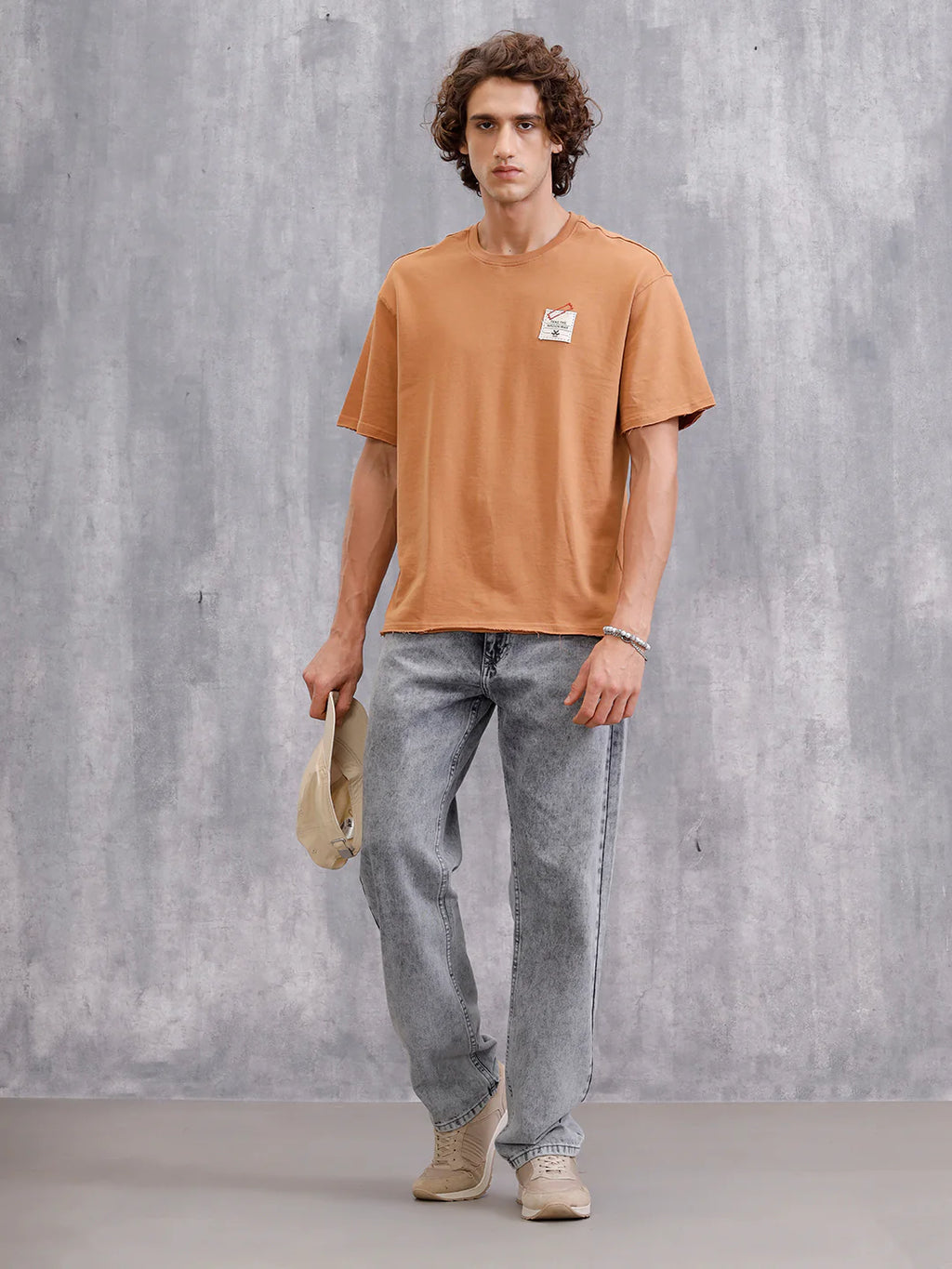 Solid Oversized T-Shirt With Printed Canvas Patch And Raw Edge Detail | Brown