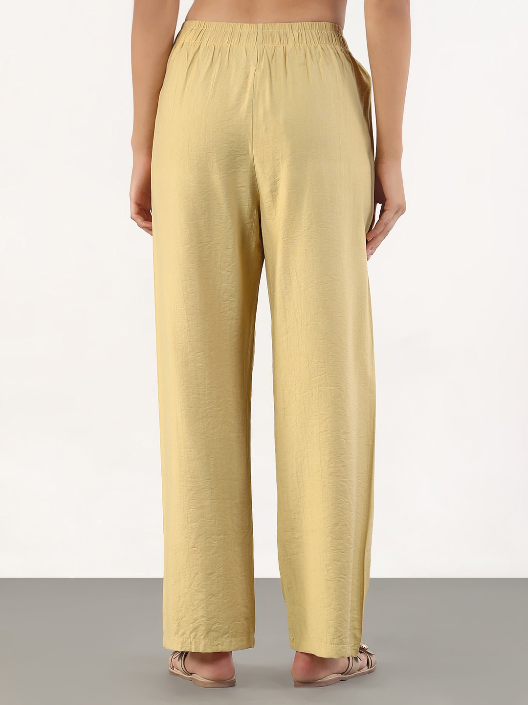 Women's Beige Loose Fit Solid Parallel Trousers