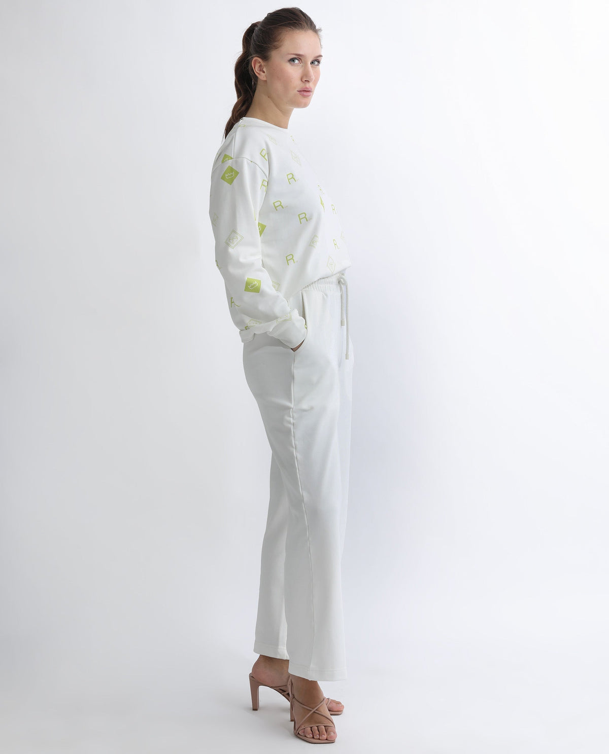 Rareism Women's Pazoo T Off White Cotton Blend Plain Ankle Length Flared Track Pant